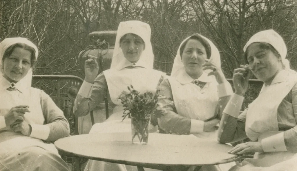 Nurses during a break sitting around a table